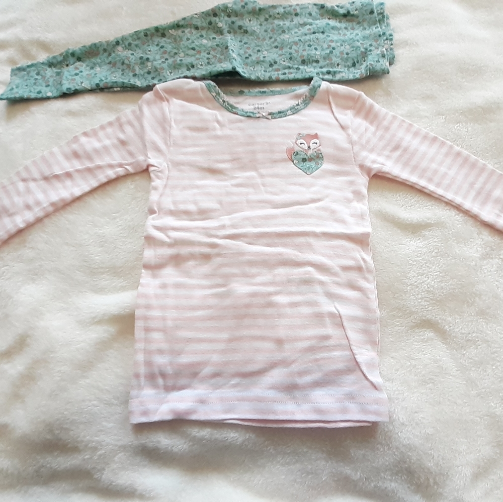 two  carter's  pajamas  in  size  24  months.